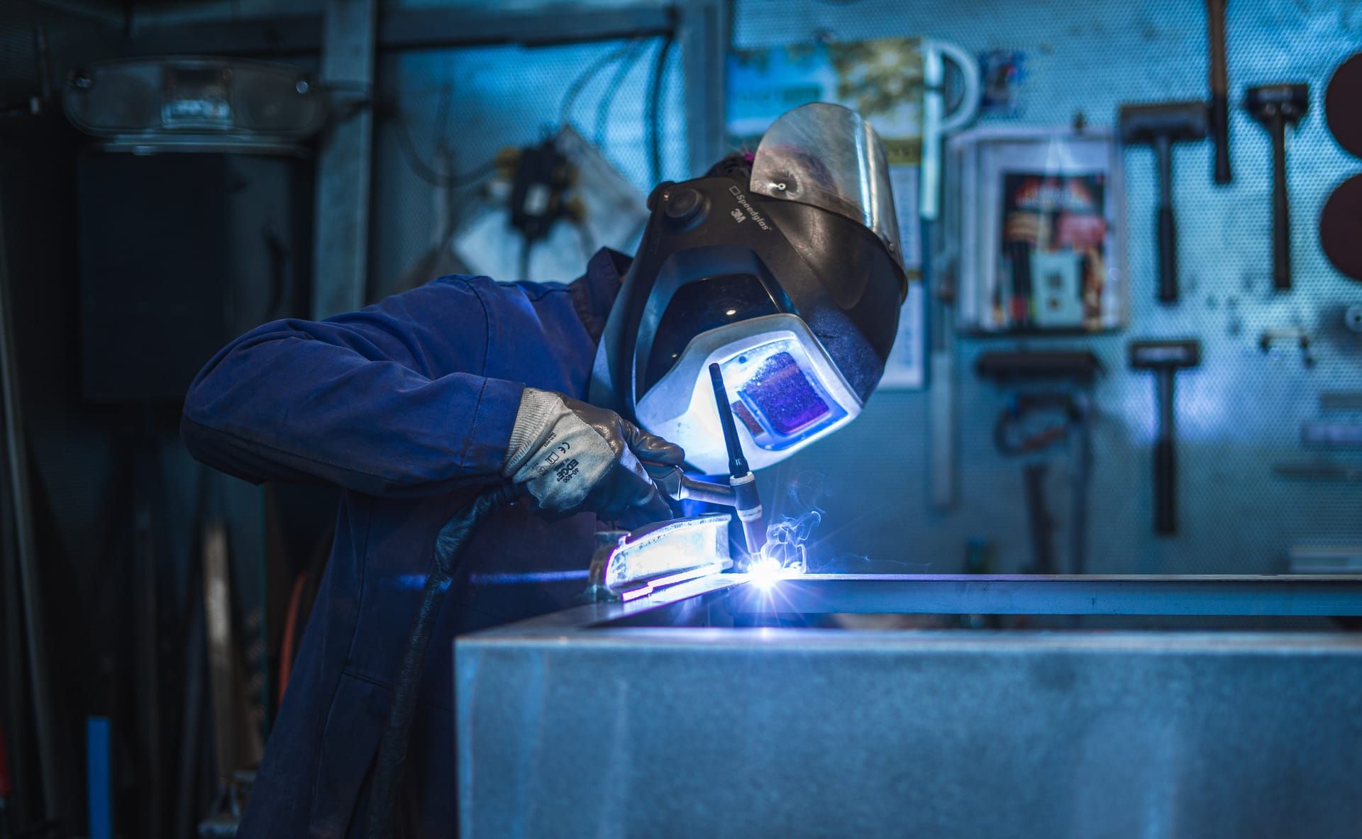 Employee welding in production